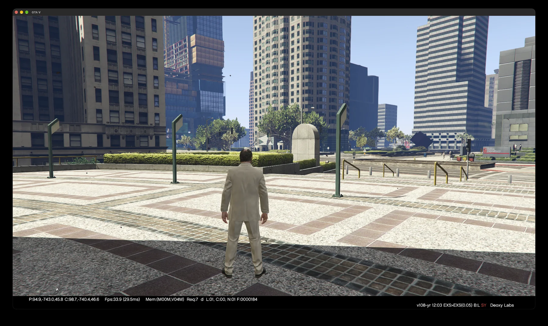 GTA V running natively on a Mac: Michael in a plaza in downtown Los Santos at midday.
